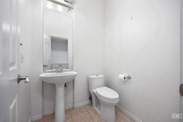 4702 Aviara Dr, Bakersfield, CA 93312 - bathroom with toilet, tile patterned floors, baseboards, and a sink