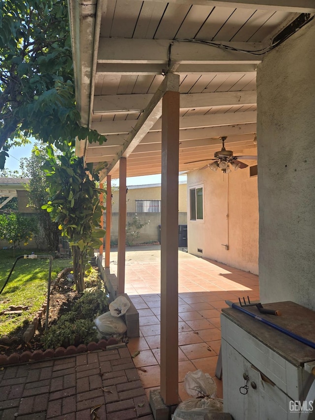 view of patio / terrace featuring ceiling fan