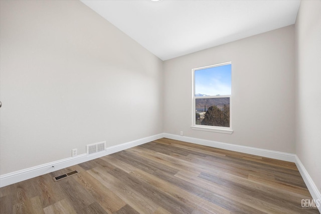 4500 Joshua Dr, Mountain Mesa, CA 93240 - spare room featuring wood finished floors and vaulted ceiling