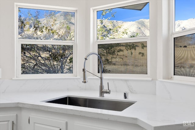 4500 Joshua Dr, Mountain Mesa, CA 93240 - kitchen view of white cabinetry and light stone counters