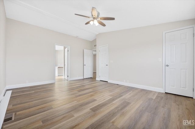 4500 Joshua Dr, Mountain Mesa, CA 93240 - unfurnished bedroom with light wood-type flooring, vaulted ceiling, and a ceiling fan