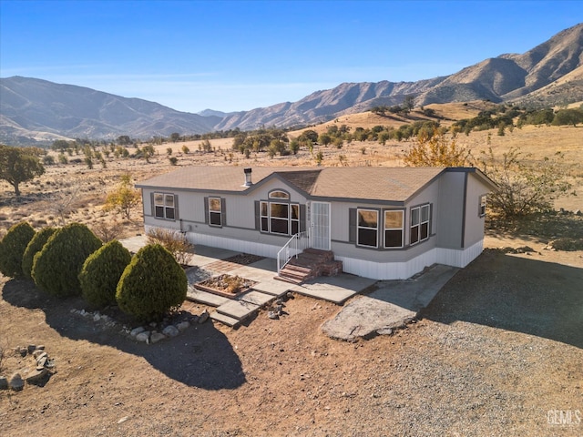 4500 Joshua Dr, Mountain Mesa, CA 93240 - rear view of house featuring a mountain view and a shingled roof
