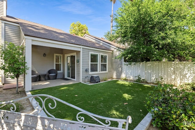 8000 Kroll Way Unit 29, Bakersfield, CA 93311 - back of property featuring roof with shingles and a patio area