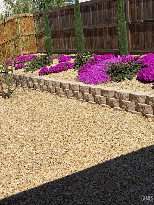 view of yard with fence