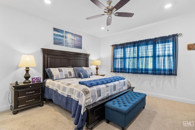 bedroom with recessed lighting, baseboards, light carpet, and a ceiling fan