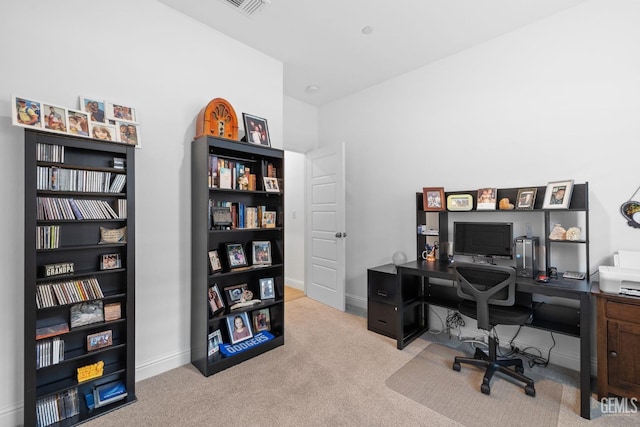 office with baseboards, carpet, and visible vents
