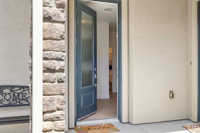 entrance to property with visible vents