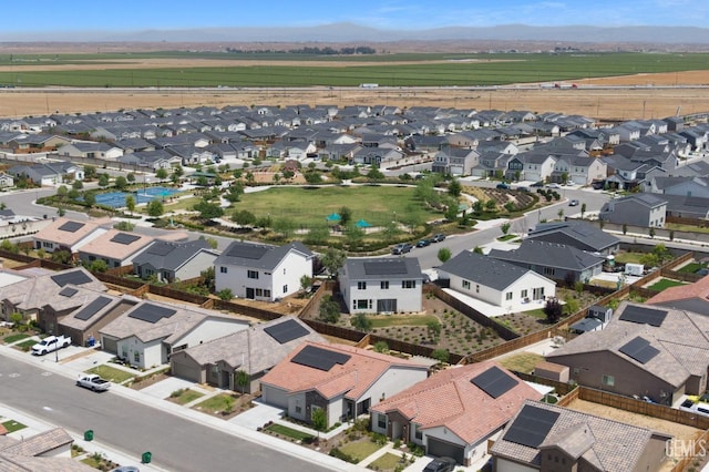 birds eye view of property with a residential view