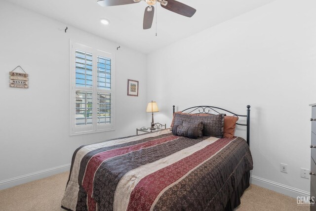 3308 Whispering Brook Ln, Shafter, CA 93263 - carpeted bedroom with baseboards and a ceiling fan