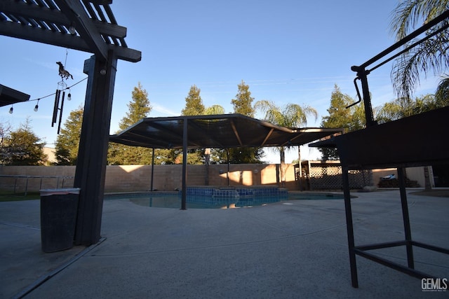 view of swimming pool featuring a fenced in pool and a fenced backyard