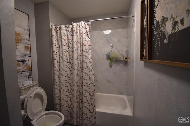 bathroom with toilet and shower / bath combo with shower curtain