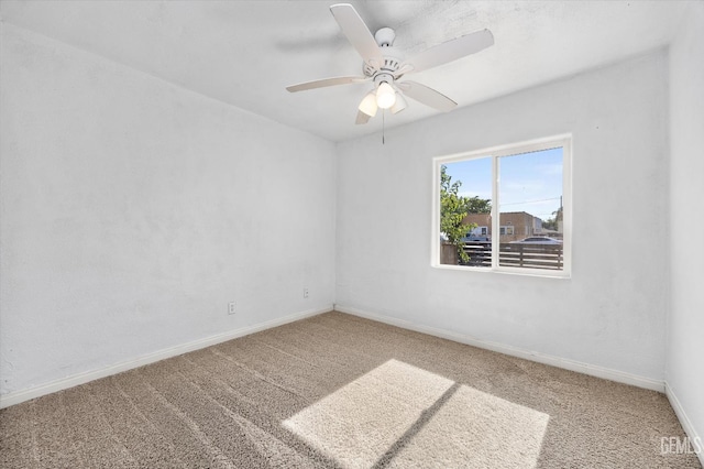 914 P St, Bakersfield, CA 93304 - carpeted spare room with baseboards and ceiling fan