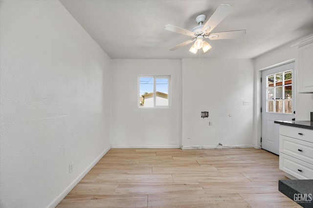 914 P St, Bakersfield, CA 93304 - spare room featuring light wood-type flooring and ceiling fan