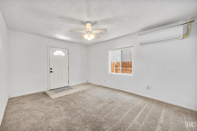 914 P St, Bakersfield, CA 93304 - carpeted foyer with an AC wall unit and a ceiling fan