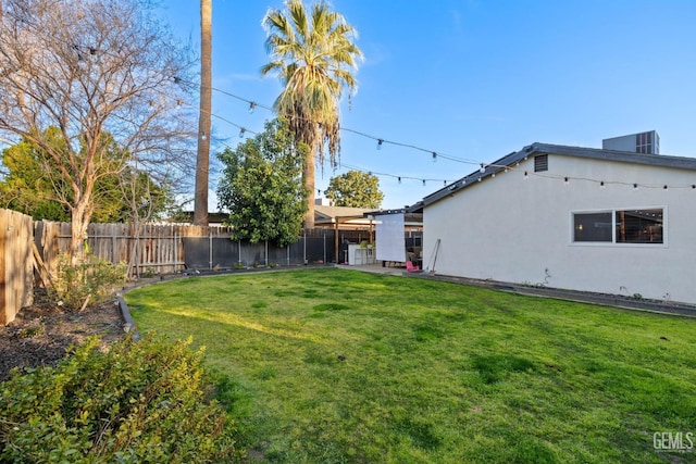 view of yard featuring a patio, cooling unit, and a fenced backyard