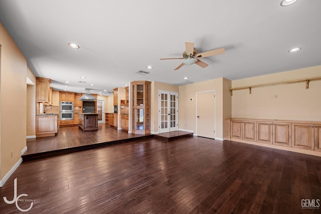 unfurnished living room featuring recessed lighting, dark wood-style flooring, visible vents, baseboards, and a ceiling fan