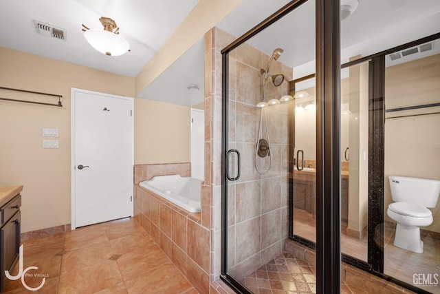 bathroom featuring visible vents, a stall shower, vanity, and a bath