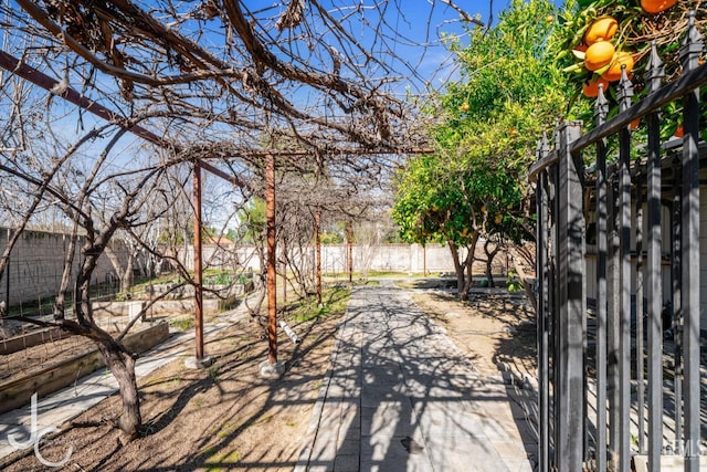 exterior space with fence private yard and a patio