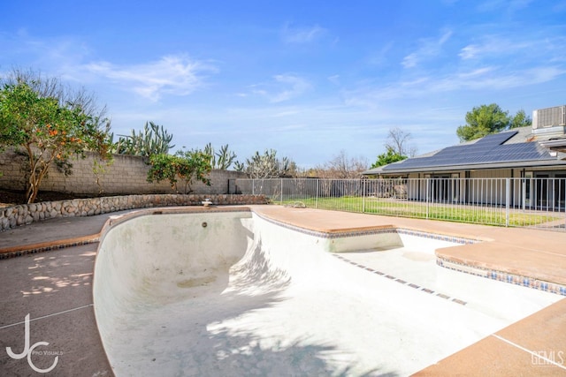 view of swimming pool with a patio area and a fenced backyard