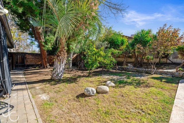 view of yard with fence