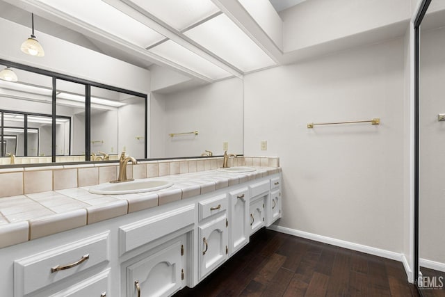 bathroom featuring vanity and hardwood / wood-style floors