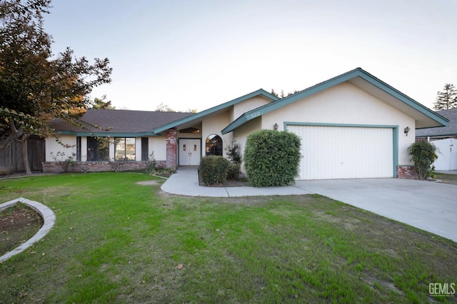 ranch-style house with a front lawn and a garage