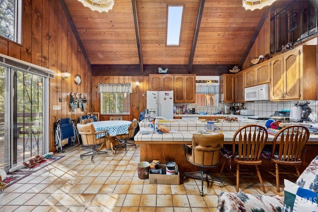 kitchen featuring tile counters, decorative backsplash, high vaulted ceiling, white appliances, and wood ceiling