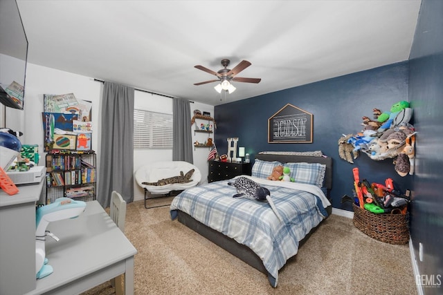 bedroom with carpet flooring, baseboards, and ceiling fan