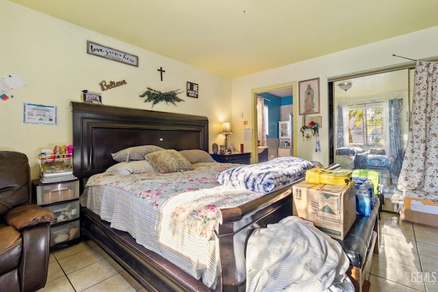 bedroom featuring light tile patterned floors