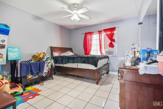 tiled bedroom featuring cooling unit and ceiling fan