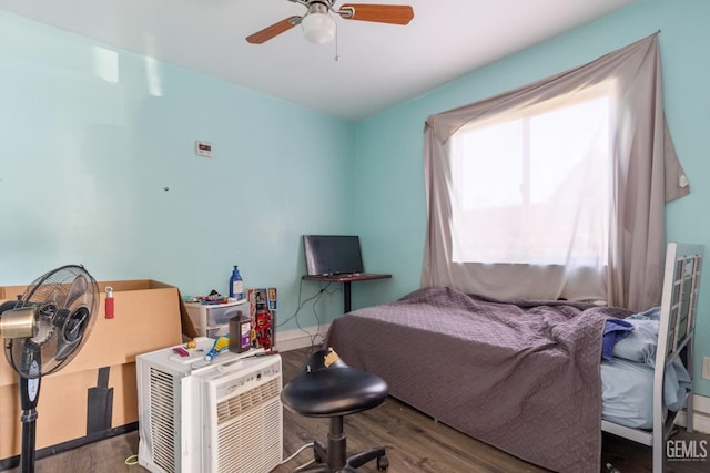 bedroom with wood-type flooring