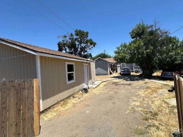 1403 Shasta St, Bakersfield, CA 93308 - view of property exterior featuring a shingled roof