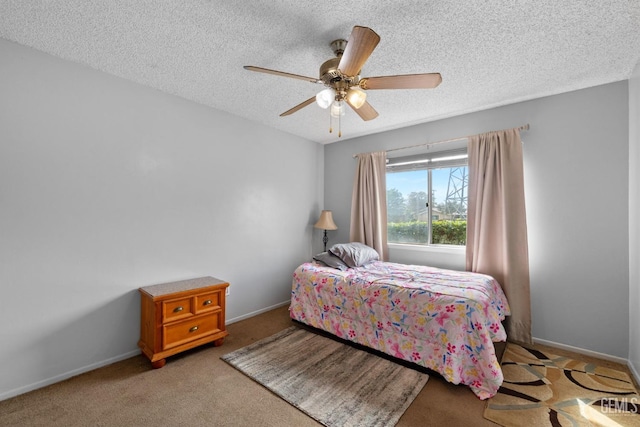 3406 Elm St, Bakersfield, CA 93301 - carpeted bedroom featuring a textured ceiling, baseboards, and ceiling fan