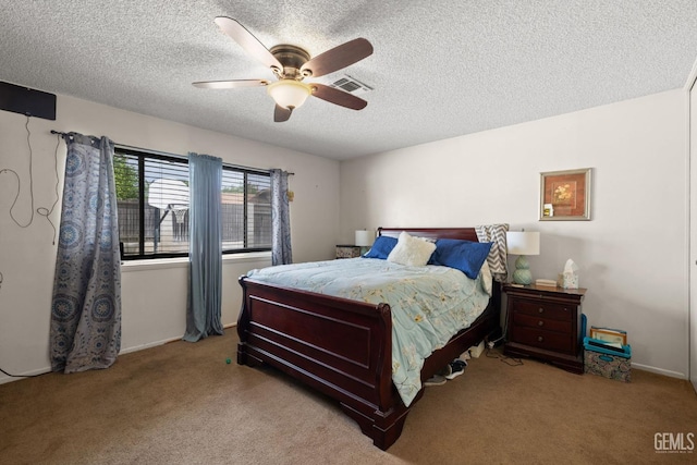3406 Elm St, Bakersfield, CA 93301 - carpeted bedroom featuring a ceiling fan, a textured ceiling, and visible vents