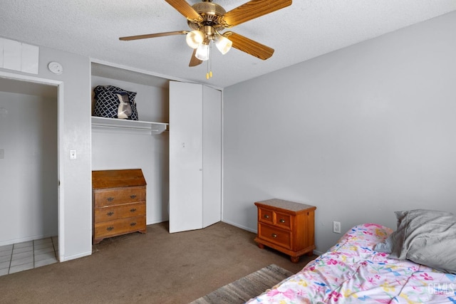 3406 Elm St, Bakersfield, CA 93301 - bedroom with a ceiling fan, carpet flooring, a textured ceiling, and a closet