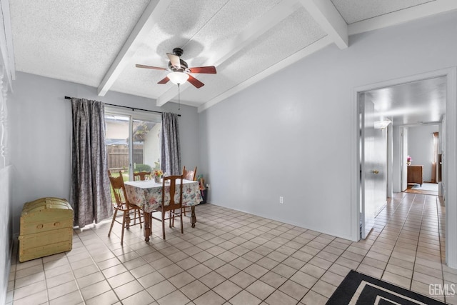3406 Elm St, Bakersfield, CA 93301 - dining room with light tile patterned floors, vaulted ceiling with beams, a textured ceiling, and ceiling fan