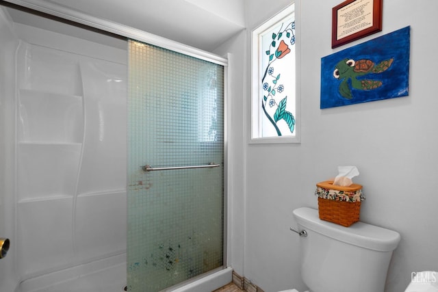3406 Elm St, Bakersfield, CA 93301 - bathroom featuring a shower stall and toilet