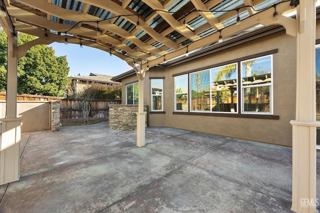 view of patio featuring a pergola