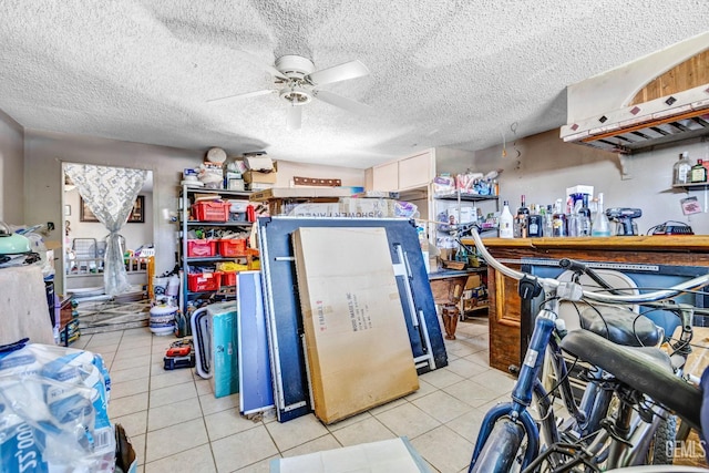 3105 Dore Dr, Bakersfield, CA 93304 - misc room with light tile patterned floors, ceiling fan, and a textured ceiling