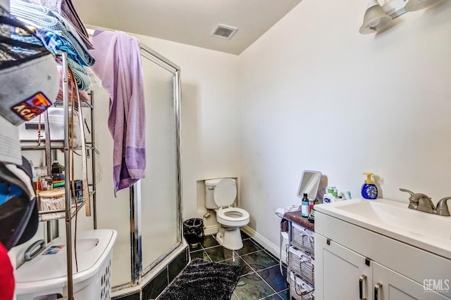 3105 Dore Dr, Bakersfield, CA 93304 - bathroom with toilet, an enclosed shower, vanity, tile patterned floors, and baseboards