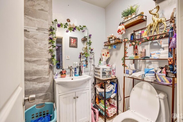 3105 Dore Dr, Bakersfield, CA 93304 - half bath featuring vanity and toilet