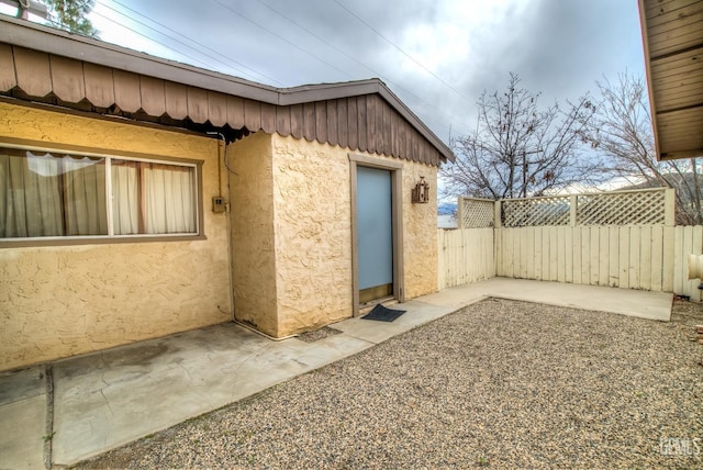 view of home's exterior with a patio