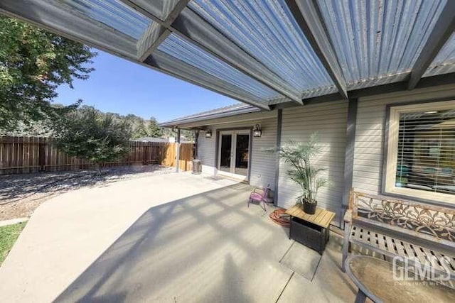 view of patio featuring french doors