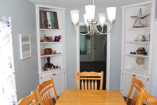 327 Ray St, Bakersfield, CA 93308 - dining area featuring a chandelier