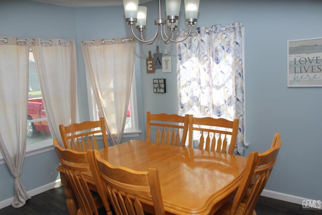 327 Ray St, Bakersfield, CA 93308 - dining room featuring a chandelier and wood finished floors