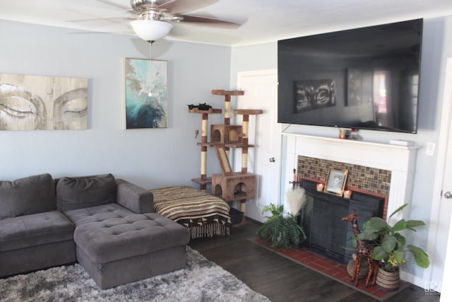 327 Ray St, Bakersfield, CA 93308 - living area with wood finished floors, a tile fireplace, and ceiling fan