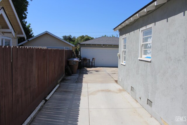 327 Ray St, Bakersfield, CA 93308 - view of patio / terrace featuring a garage