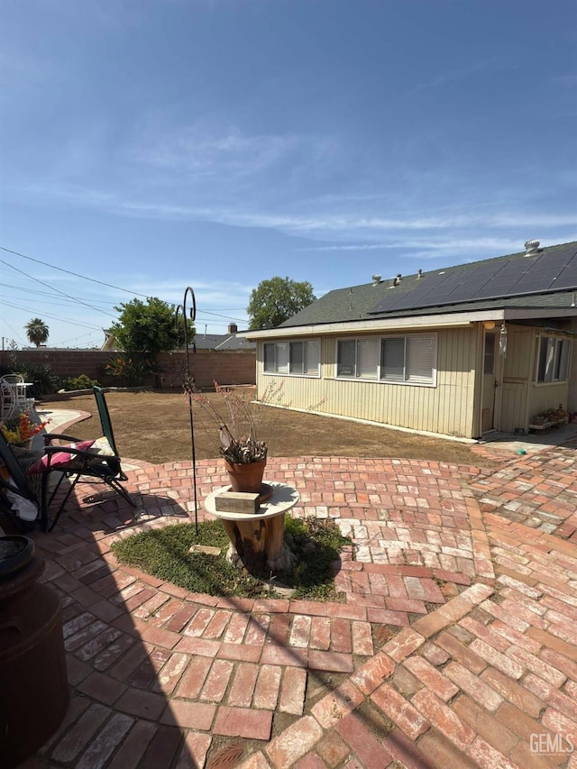 exterior space featuring a fenced backyard