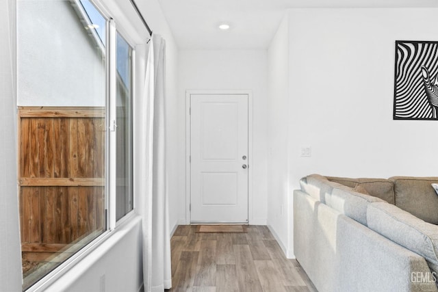 hall featuring light wood-type flooring