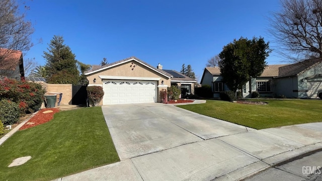 single story home featuring a front lawn, solar panels, and a garage